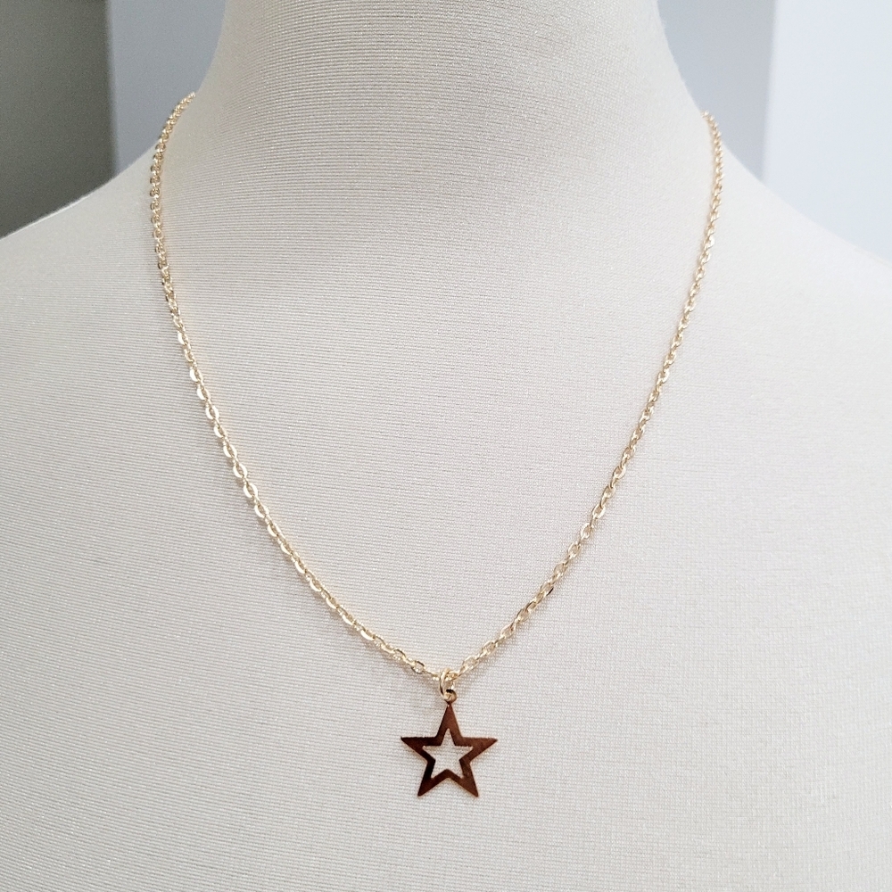 Brand New Gold Tone Star Necklace